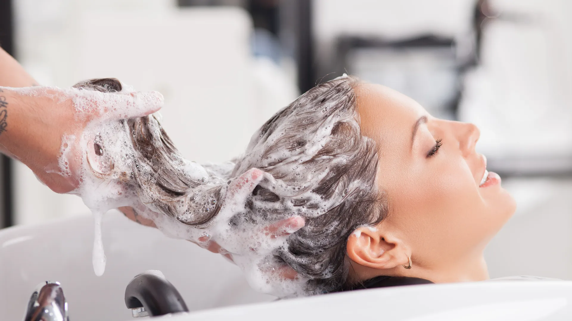 Person getting hair washed